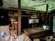 Messy interior space with shelves, boxes, and various stored items at 6000 S Main St, Salisbury, NC 28147