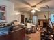 View of a living room with hardwood flooring, a ceiling fan, and natural light at 6000 S Main St, Salisbury, NC 28147