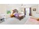 Spacious bedroom with a decorative bed frame and a large window for natural light, creating a peaceful retreat at 6222 Ohaus Ct # 59, Charlotte, NC 28216