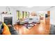 Bright living area with hardwood floors, a fireplace, open layout and neutral decor for easy entertaining at 6222 Ohaus Ct # 59, Charlotte, NC 28216