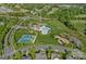 Community amenities featuring a pool, tennis courts, and a playground at 642 Vega Nw St, Concord, NC 28027