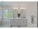 Elegant bathroom featuring double sinks, walk-in shower, and modern fixtures at 642 Vega Nw St, Concord, NC 28027