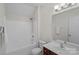 Bright bathroom with shower-tub, vanity and mirror at 642 Vega Nw St, Concord, NC 28027