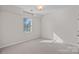 Bedroom with a window offering natural light at 642 Vega Nw St, Concord, NC 28027