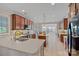 Spacious kitchen with stainless steel appliances, center island, and ample cabinet space at 642 Vega Nw St, Concord, NC 28027