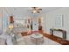 Open-concept living area with seamless flow to kitchen, hardwood floors, and natural light at 642 Vega Nw St, Concord, NC 28027