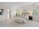 Spacious main bedroom with tray ceiling, neutral decor and ample natural light at 642 Vega Nw St, Concord, NC 28027