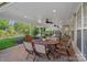Beautiful covered patio with a table and chairs, and inviting seating at 642 Vega Nw St, Concord, NC 28027