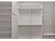 Bright walk-in closet with adjustable shelving and ample storage space at 642 Vega Nw St, Concord, NC 28027