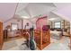 Multipurpose attic bedroom offers exercise space and bedroom suite at 6617 Wannamaker Ln, Charlotte, NC 28226