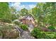 Beautiful brick home with lush landscaping, a charming garden, and a welcoming exterior at 6617 Wannamaker Ln, Charlotte, NC 28226