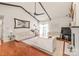 Spacious living room with high ceilings, hardwood floors, and comfortable seating at 6617 Wannamaker Ln, Charlotte, NC 28226