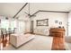 Inviting living room with hardwood floors, neutral furniture, and ample natural light at 6617 Wannamaker Ln, Charlotte, NC 28226