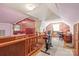 Finished attic space with bedroom, office, exercise space, and vintage wallpaper at 6617 Wannamaker Ln, Charlotte, NC 28226