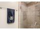 Beautiful tiled shower with glass door and accent tiling at 6617 Wannamaker Ln, Charlotte, NC 28226