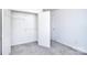 A bedroom with gray carpet, a door to the closet, and white walls at 6631 Vlosi Dr, Charlotte, NC 28226