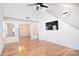 Dining room with hardwood floors and a modern light fixture at 6631 Vlosi Dr, Charlotte, NC 28226