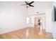 Bright and airy living room featuring hardwood floors and a view of the open-concept layout at 6631 Vlosi Dr, Charlotte, NC 28226