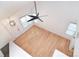 Bright living room with hardwood floors, a ceiling fan, and lots of natural light at 6631 Vlosi Dr, Charlotte, NC 28226