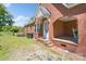 Classic brick home with inviting front porch and well-maintained lawn at 709 Myrtle Dr, Rock Hill, SC 29730