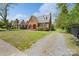 Charming brick home featuring a well-manicured lawn, traditional design, and inviting curb appeal at 709 Myrtle Dr, Rock Hill, SC 29730
