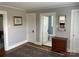 Hallway view showcasing doors, hardwood floors, and chest of drawers at 709 Myrtle Dr, Rock Hill, SC 29730