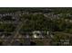 Aerial view of the home with a large backyard, neatly lined neighborhood, and manicured lawns at 7113 Amberly Hills Rd, Charlotte, NC 28215