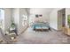 Serene main bedroom with natural light, neutral tones, and coordinated decor at 7113 Amberly Hills Rd, Charlotte, NC 28215