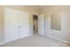 This bedroom features double door closet, carpeted floors and neutral walls at 749 Petersburg Dr, Fort Mill, SC 29708