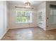 The dining room has a large window for plenty of natural light at 749 Petersburg Dr, Fort Mill, SC 29708