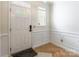 Welcoming entryway showcasing detailed molding and warm flooring at 749 Petersburg Dr, Fort Mill, SC 29708