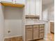 Bright kitchen with white cabinets, granite counters, and a dedicated pantry area at 749 Petersburg Dr, Fort Mill, SC 29708