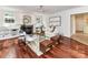 Cozy living room with a fireplace, hardwood floors, and stylish decor, creating a relaxing atmosphere at 8921 Magnolia Heights Ct, Charlotte, NC 28270