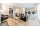 Cozy living room with an open concept to the kitchen and dining area, perfect for entertaining at 984 Park Slope Dr, Charlotte, NC 28209