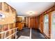 Basement rec room with bar area and access to the outdoors at 1025 Hefner Nw Dr, Conover, NC 28613