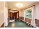 The dining room features access to the basement and a sunny window at 1025 Hefner Nw Dr, Conover, NC 28613