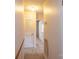 Hallway with carpet flooring leading to different areas at 1025 Hefner Nw Dr, Conover, NC 28613