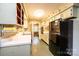 Functional kitchen featuring black appliances and efficient layout at 1025 Hefner Nw Dr, Conover, NC 28613