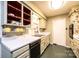 Kitchen featuring white countertops, ample storage, and open shelving at 1025 Hefner Nw Dr, Conover, NC 28613