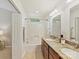 Bathroom with double vanity, granite counters, wood cabinets, and tub/shower combo at 104 Aurora Ln, Huntersville, NC 28078