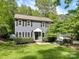 Charming two-story home with blue siding, black shutters, and a well-manicured lawn at 104 Aurora Ln, Huntersville, NC 28078