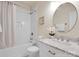 Well-lit bathroom featuring tub, shower, and vanity with marble countertop at 105 Runningdeer Dr, Mooresville, NC 28117