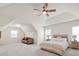 Large main bedroom with natural light featuring a sitting area, carpet, and neutral colors at 105 Runningdeer Dr, Mooresville, NC 28117