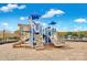 will love this blue and beige playground with slides, stairs, and climbing wall, set on a wood chip base at 105 Runningdeer Dr, Mooresville, NC 28117