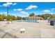 Enjoy community living with a large swimming pool, lounge chairs, tables and clubhouse in the background at 105 Runningdeer Dr, Mooresville, NC 28117