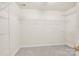A well-organized walk-in closet features shelves for clothing and accessories at 105 Runningdeer Dr, Mooresville, NC 28117