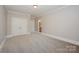 Neutral bedroom with carpet, walk-in closet, and white trim at 108 Bare Foot Ln, Mooresville, NC 28117
