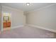 Neutral bedroom with carpet and an attached bathroom at 108 Bare Foot Ln, Mooresville, NC 28117