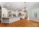 Well-appointed kitchen featuring a central island, stainless steel appliances, and ample counter space at 108 Bare Foot Ln, Mooresville, NC 28117