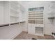 Organized walk-in closet with shelving and hanging rods for optimal storage at 108 Bare Foot Ln, Mooresville, NC 28117